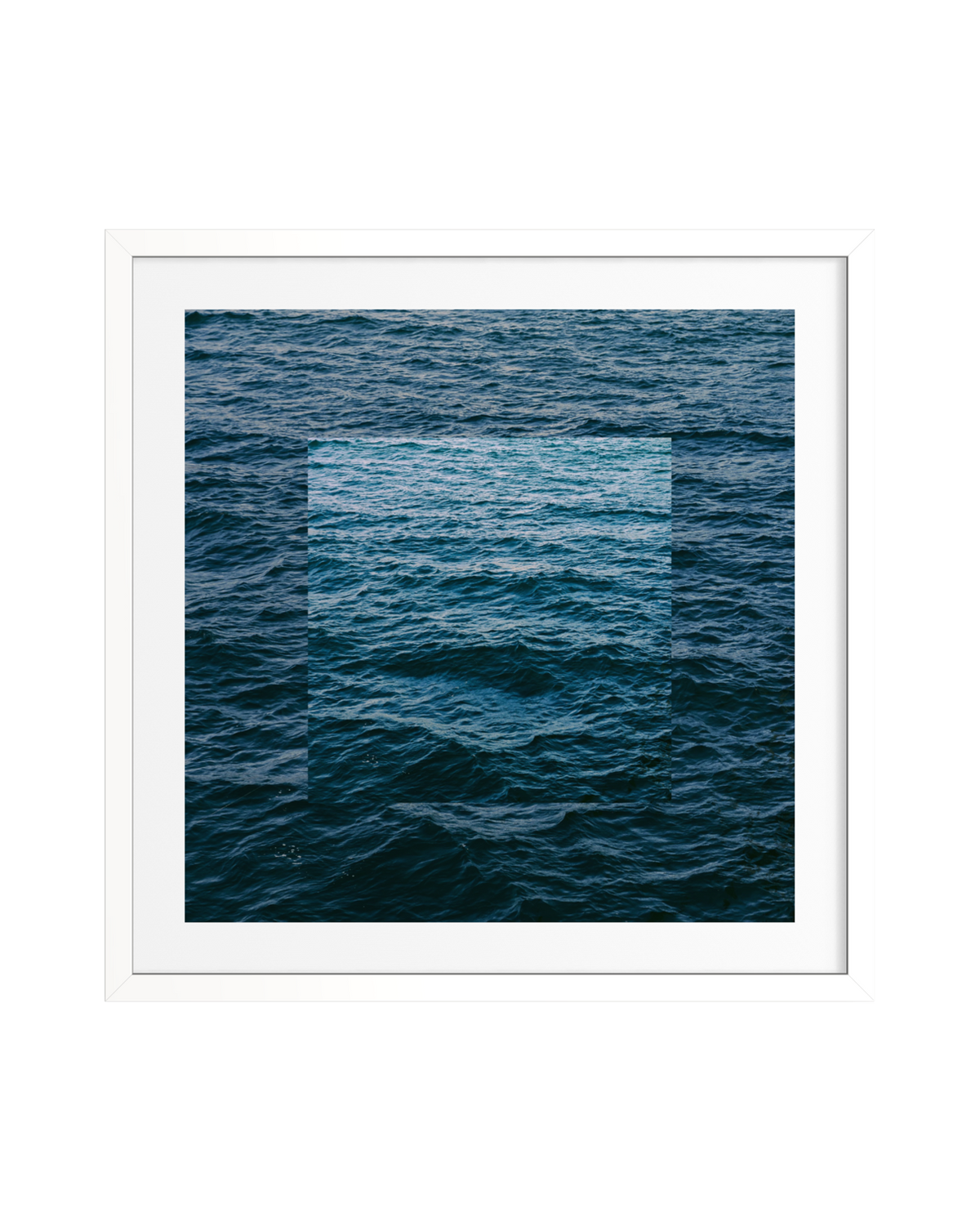 Framed print of gentle blue ocean waves with a centered pale blue square.