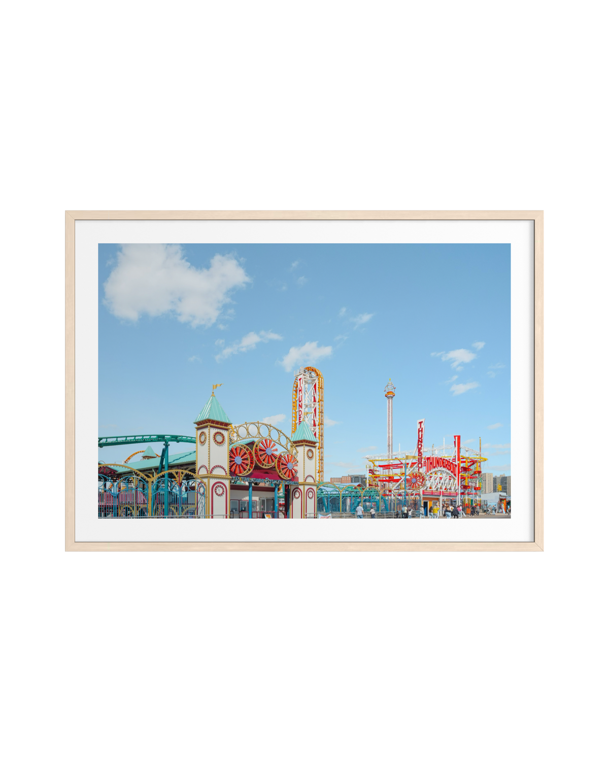 Thunderbolt roller coaster at Coney Island amusement park in Brooklyn, New York, beneath clear blue sky.