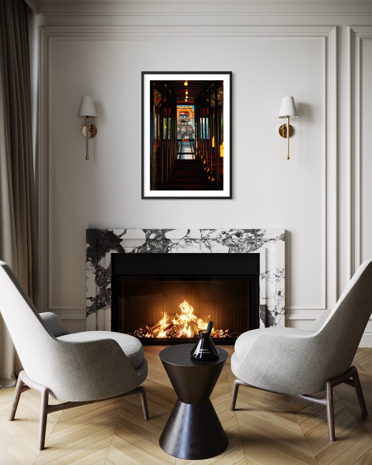 Two DTLA Funicular chairs face a marble fireplace in an elegant Los Angeles room with architectural details.