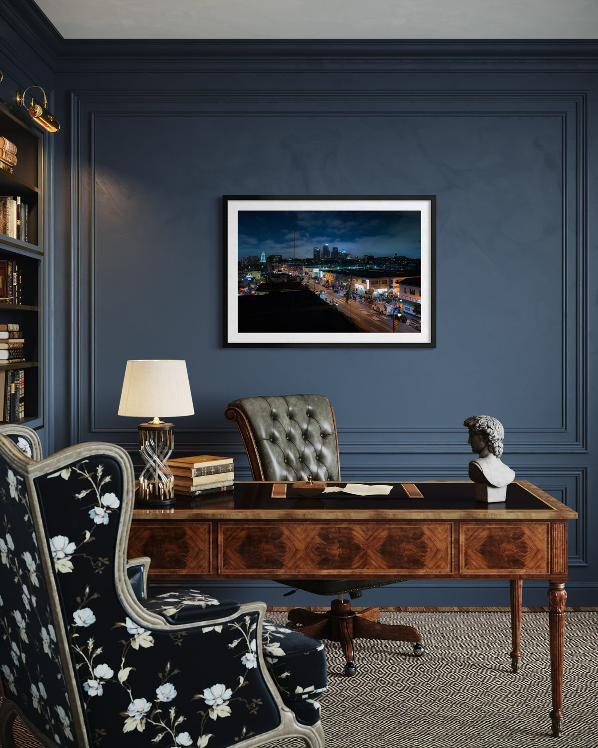 DTLA Nights cityscape print featuring a Los Angeles rooftop, displayed in a blue-walled room with a floral chair.
