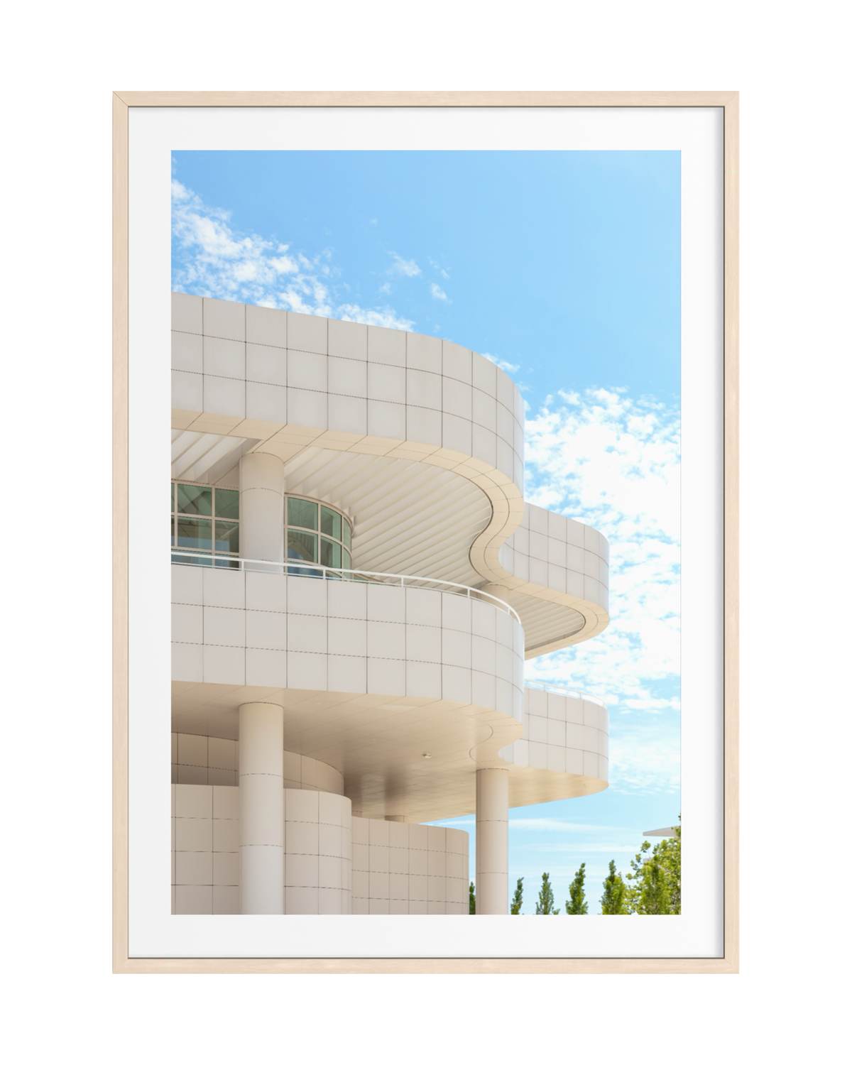The Getty Center’s curved white walls and light wood details stand out under a clear blue Los Angeles sky.