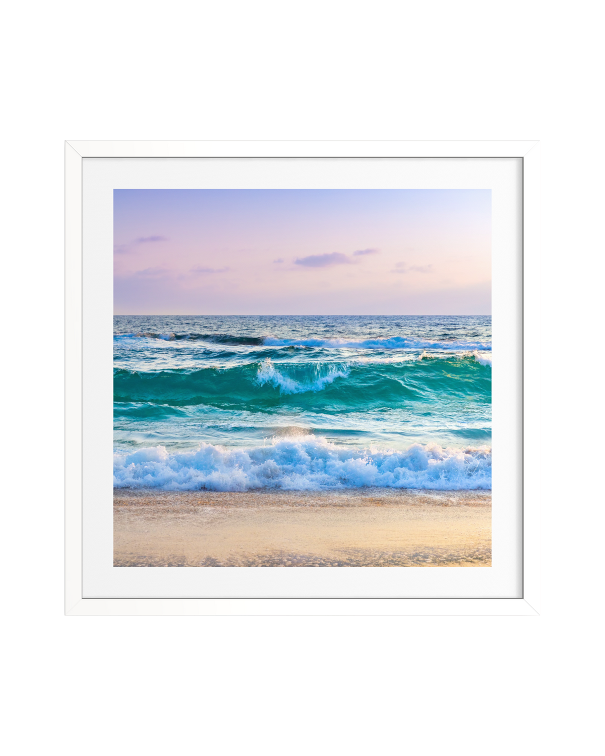 Framed photo shows gentle Pacific waves washing onto a sandy beach at sunset.