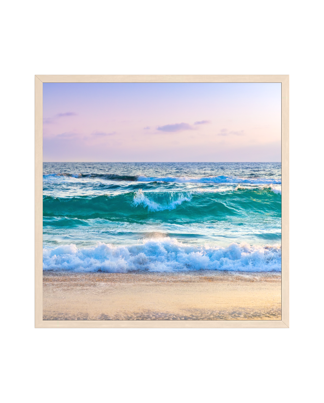 Pacific waves gently roll onto a sandy beach beneath soft pastel skies. Framed fine art photography print.