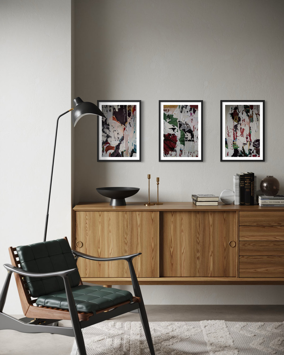 Wooden sideboard, green chair, and Paste-Ups Photographic Installation on wall in modern living space.