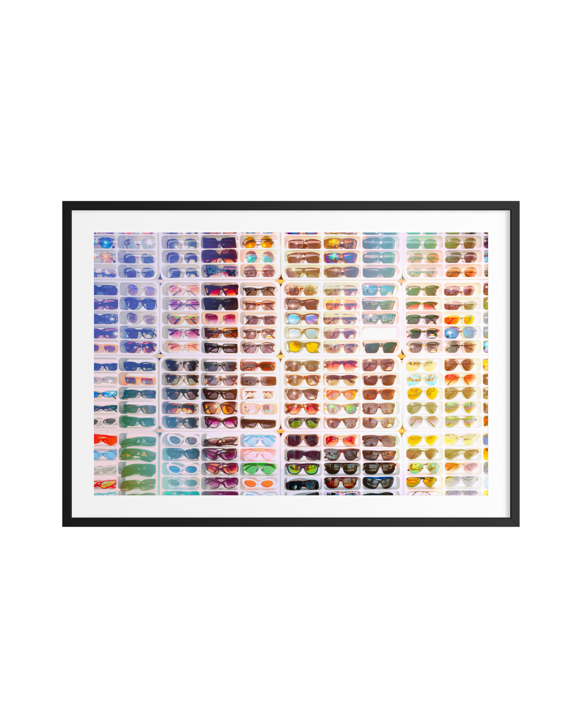 Colorful sunglasses neatly arranged in a grid, displayed in the photo print “Shades of Summer.”.