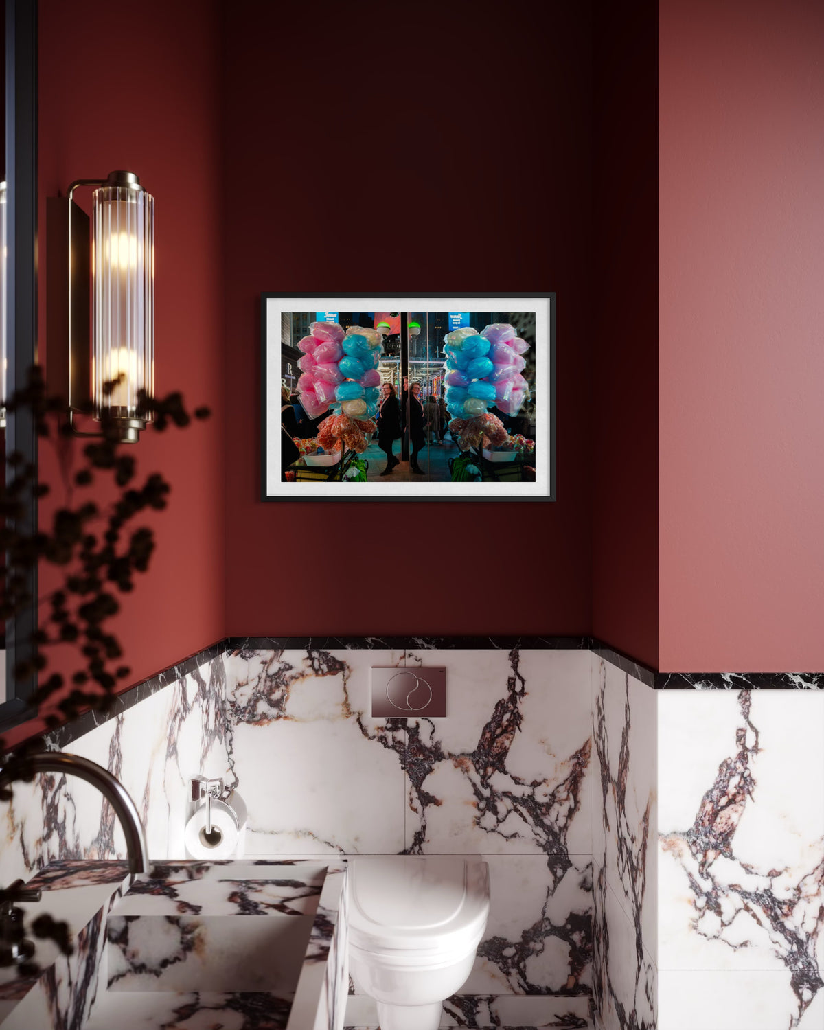 Street scene with people holding colorful balloons, displayed as wall art in a maroon and marble bathroom.