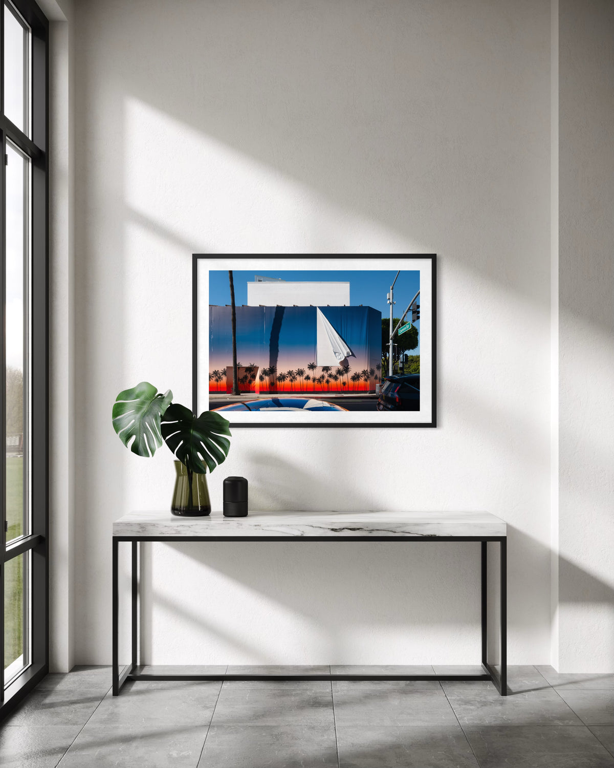 Framed “Beverly Hills Revealed” photo featuring a bright California cityscape.