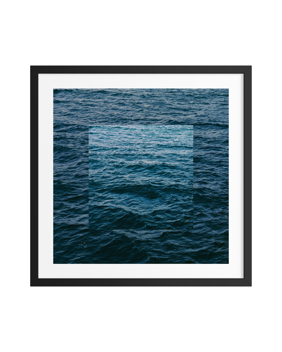 Minimal ocean waves with a soft light overlay, framed as wall art. No visible landmarks or city in scene.