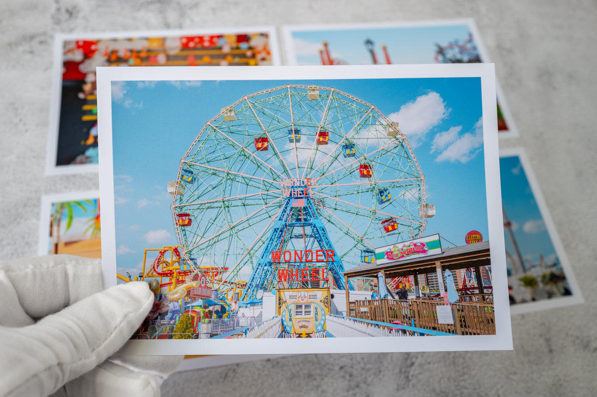 Gloved hand holding a Coney Island photo print, part of the Small Print Set No. 03, New York.