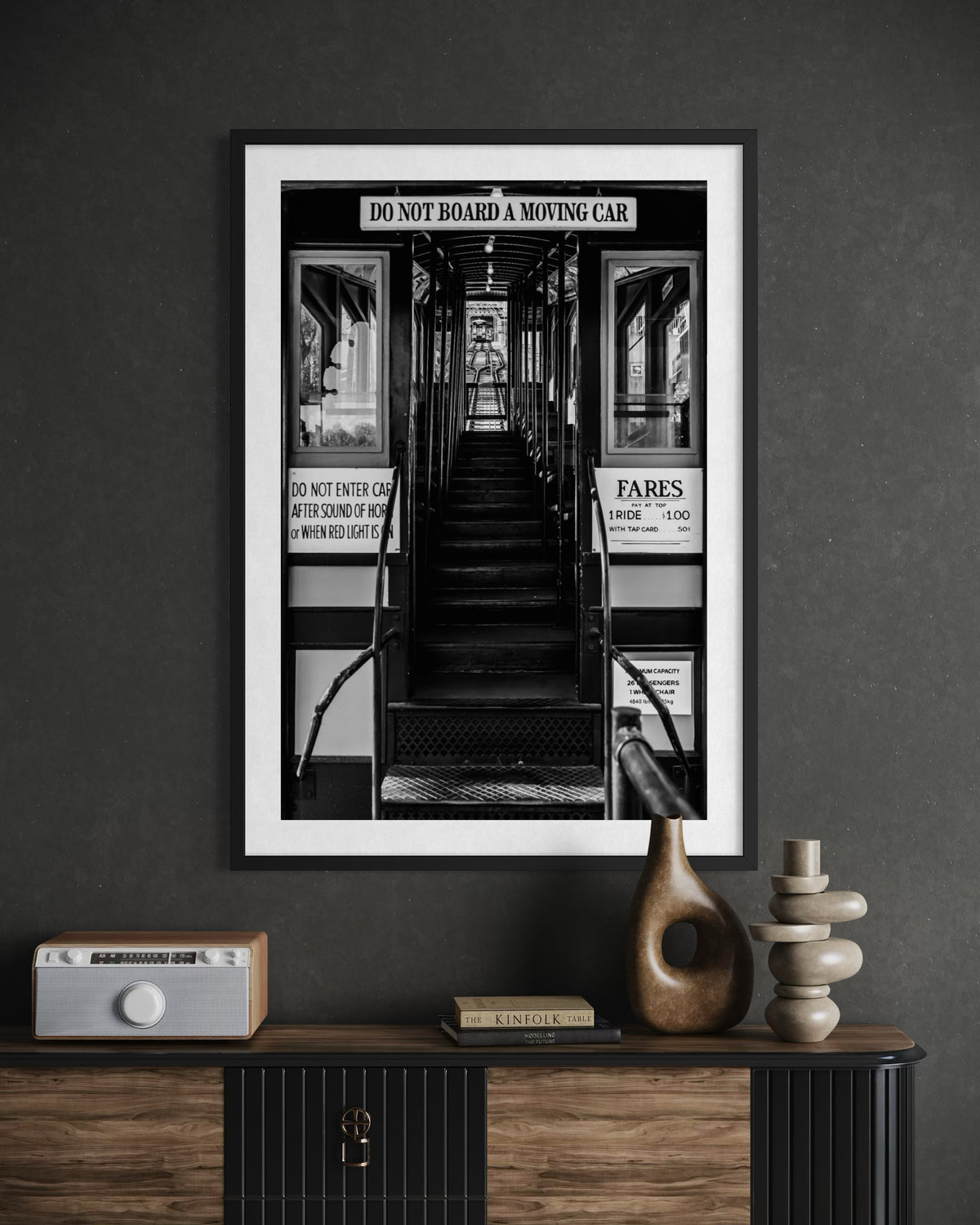 Black and white photo of a downtown Los Angeles funicular train car, vintage style.