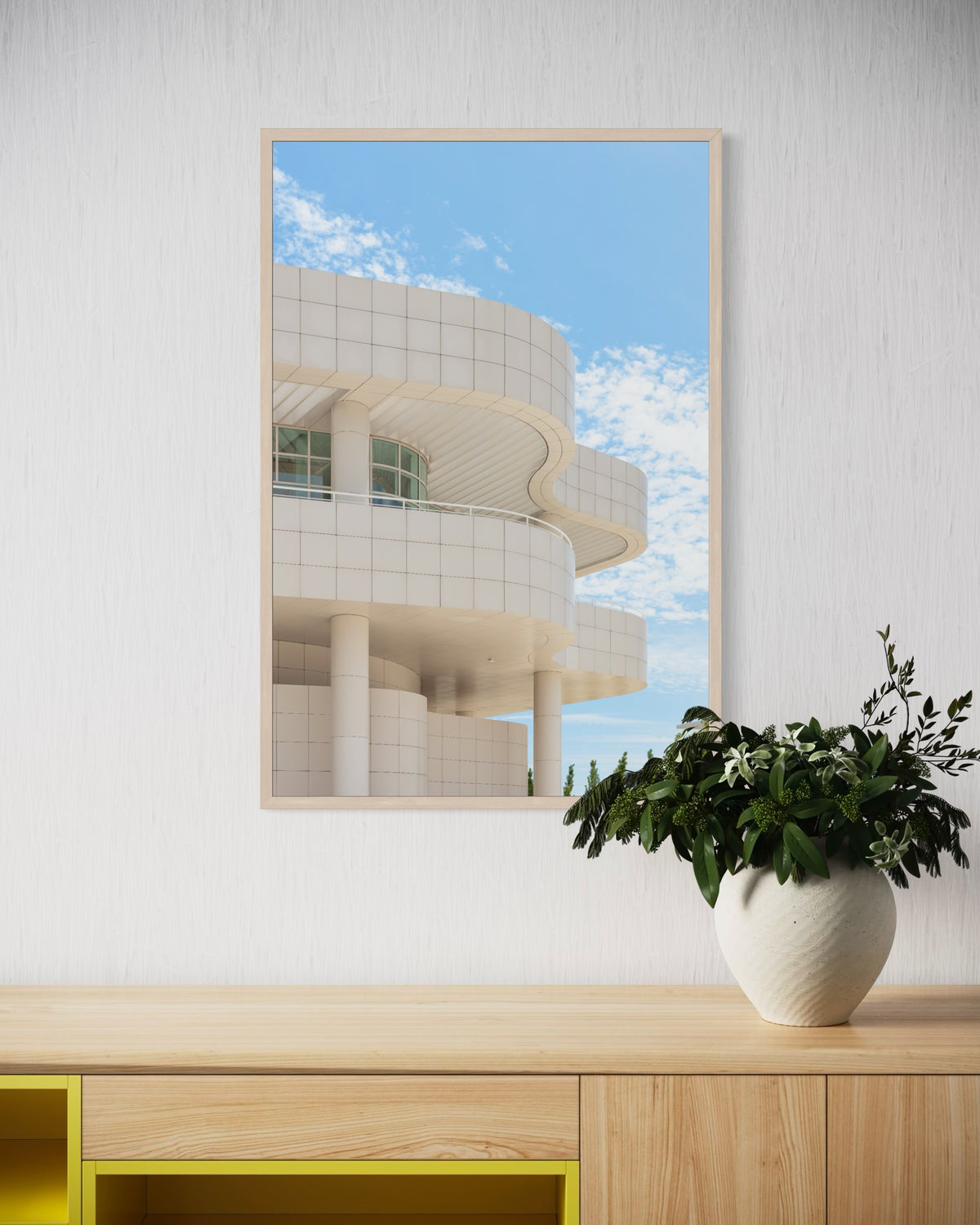 Framed photograph of modern Los Angeles architecture set against a clear blue sky.