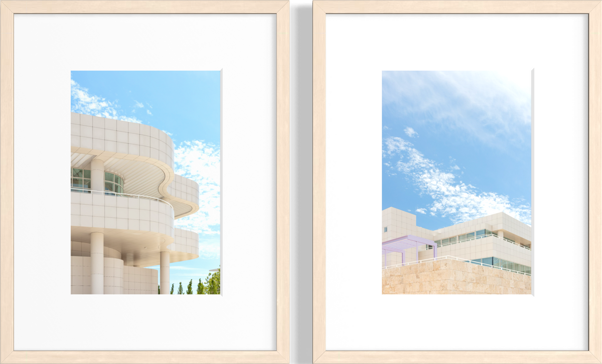 Two framed prints featuring modern white Getty Center buildings beneath blue skies in Los Angeles.