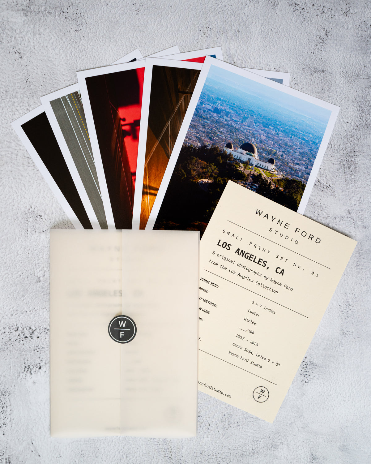 Los Angeles print set with No. 01 photograph, detail card, and envelope arranged on a textured surface.