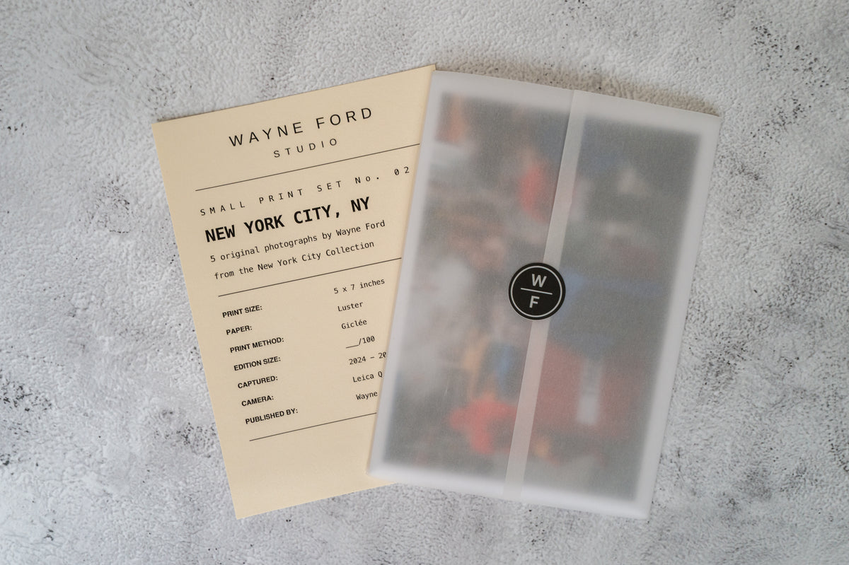 Limited edition New York City photo prints with info sheet, translucent folder, and WF sticker visible.