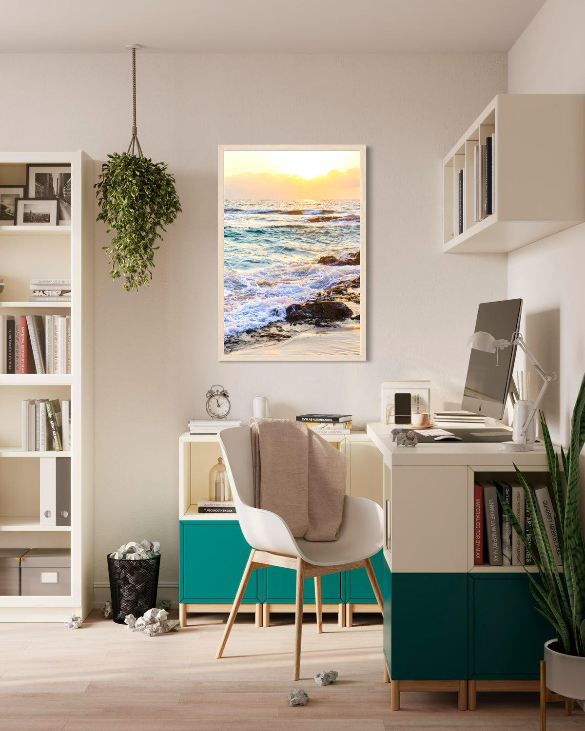 Desk, plants, and bookshelves in a modern office with the Ocean Sunset photo displayed on the wall.