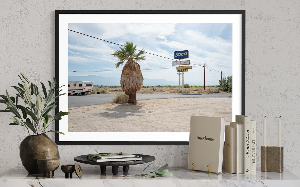 Palm tree and RV beside an old gas station sign in Palm Desert, California. Framed photograph print.