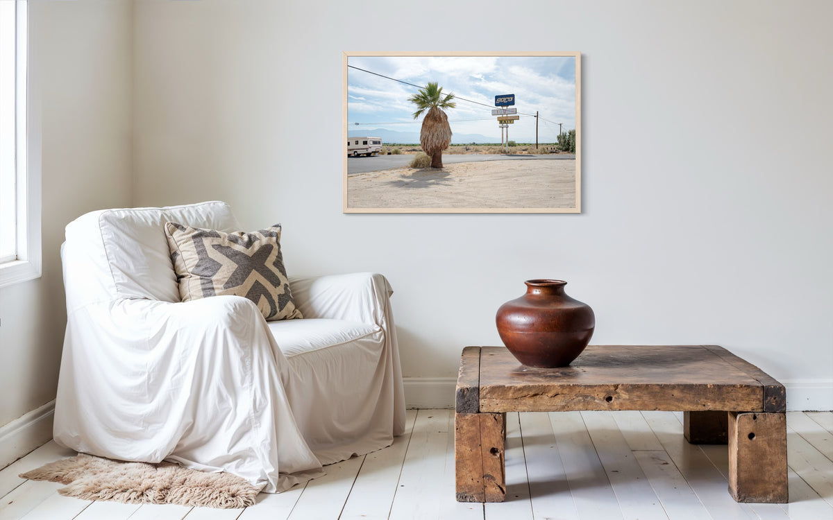 Framed “Palm Desert Roadside” photograph features a desert road scene near Palm Desert, California.