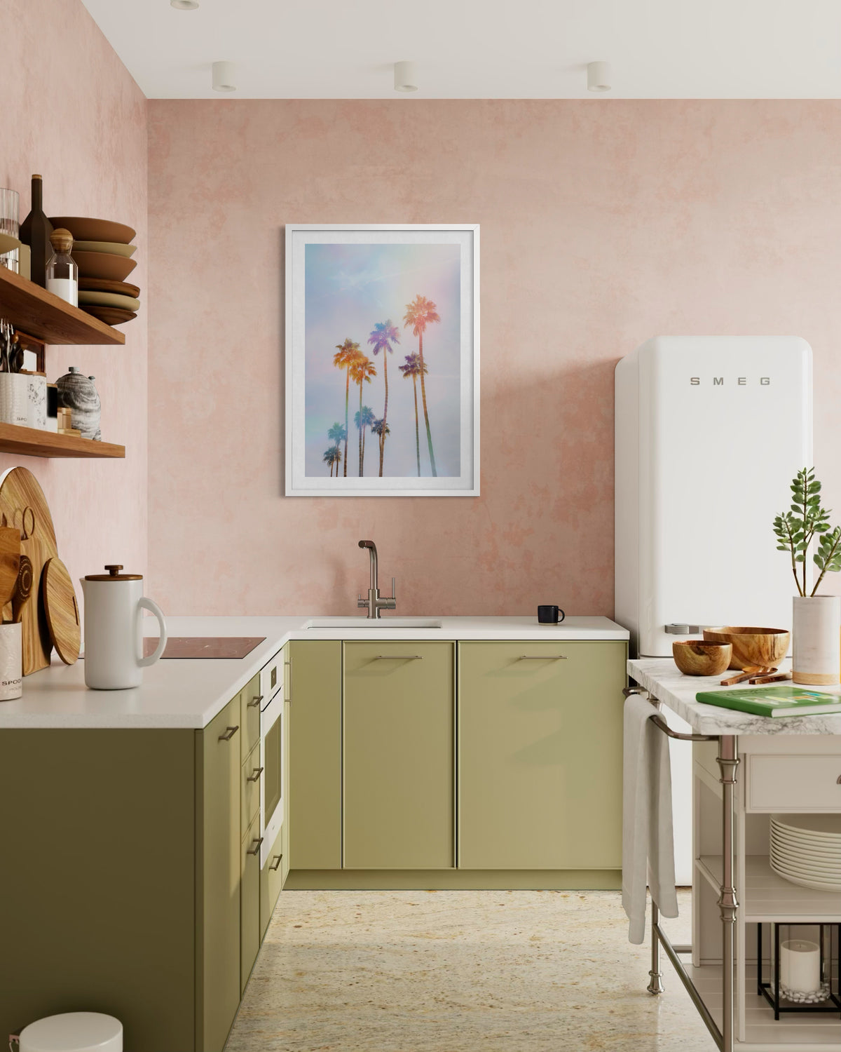 Palm Springs kitchen with olive cabinets, pink walls, palm photo, and a vintage white SMEG refrigerator.