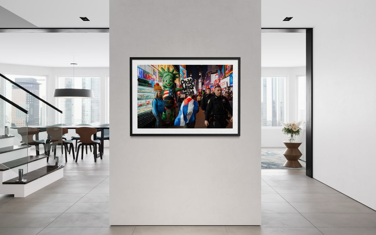 Proxy Wars Are Evil“ poster in a black frame on a white wall in a minimalist living room setting.