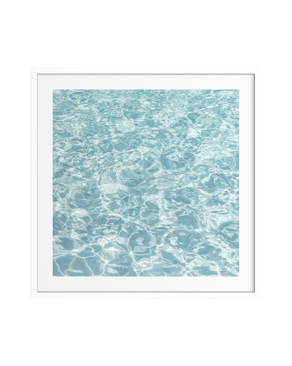 Calm blue water with gentle light reflections, bordered by a white frame.