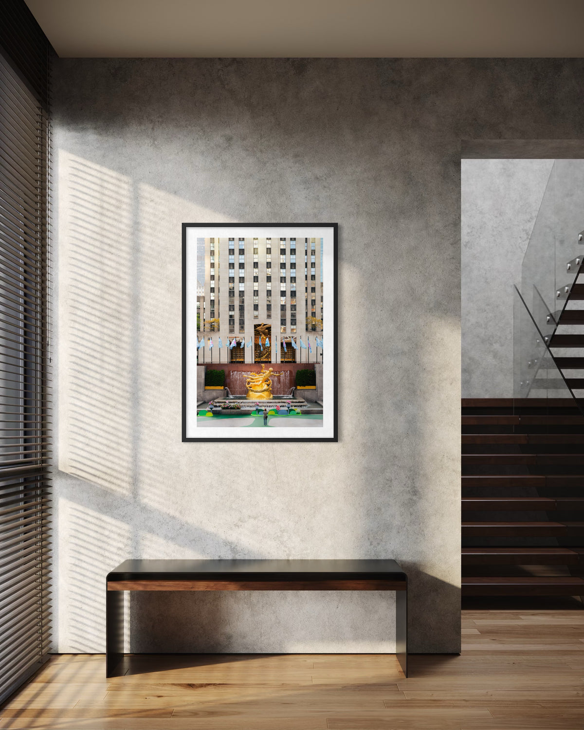 Prometheus statue at Rockefeller Center, New York City, seen above a hall bench in a modern interior mockup.