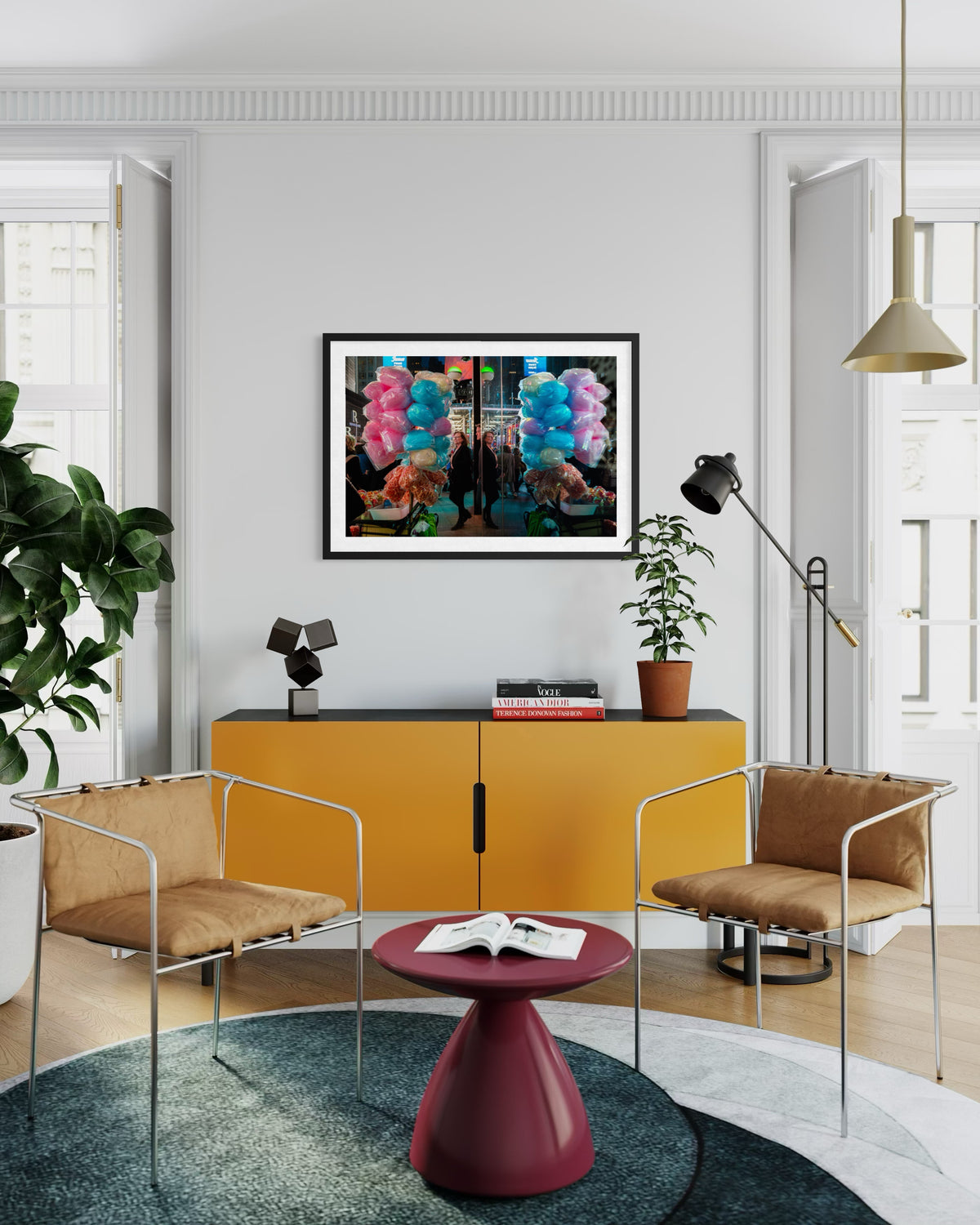 Living room with Sweet Reflections art, pastel pink and blue tones, brown chairs, yellow console, and green plants.