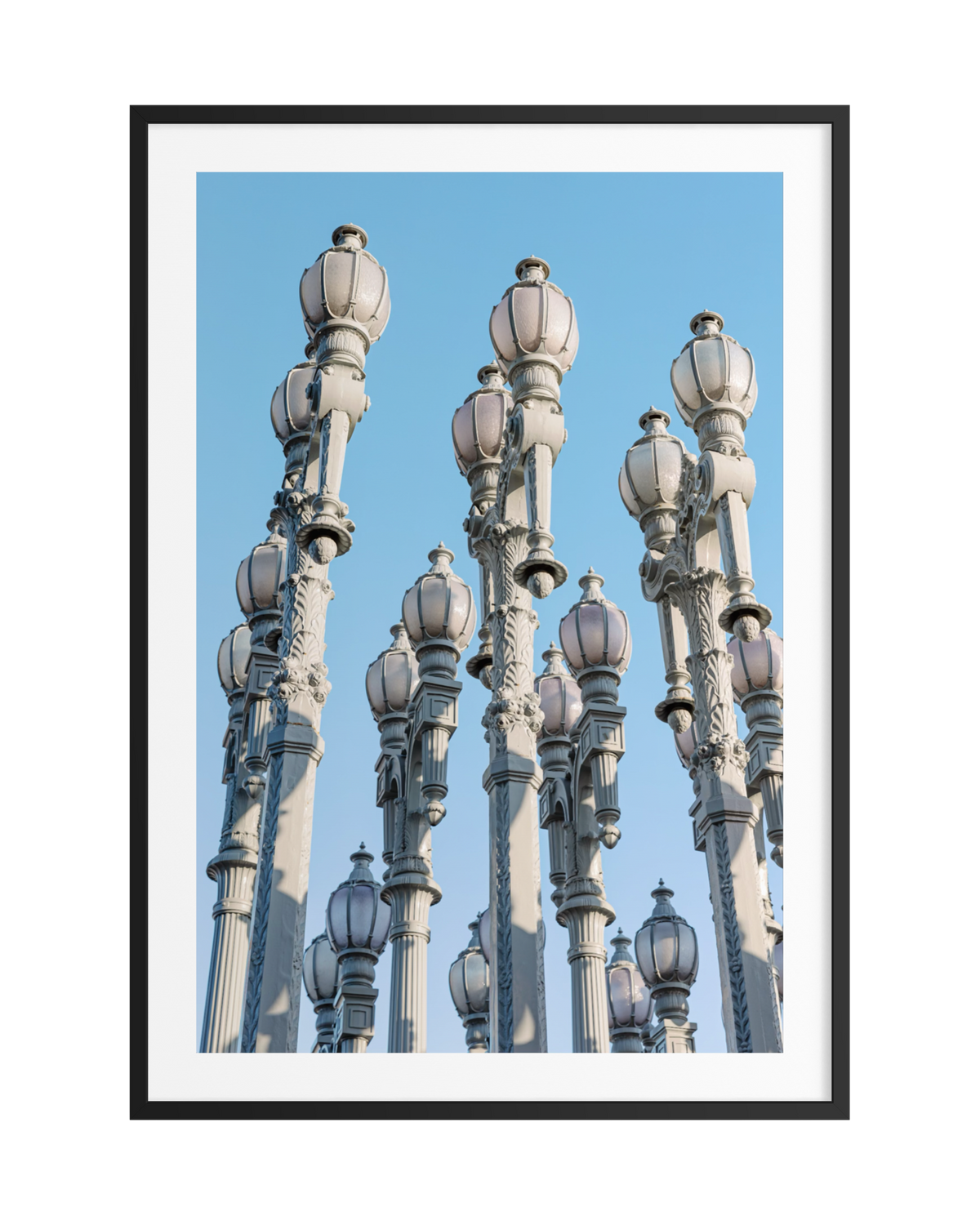 Vintage street lamps at Urban Light, Los Angeles, in a classic black frame.